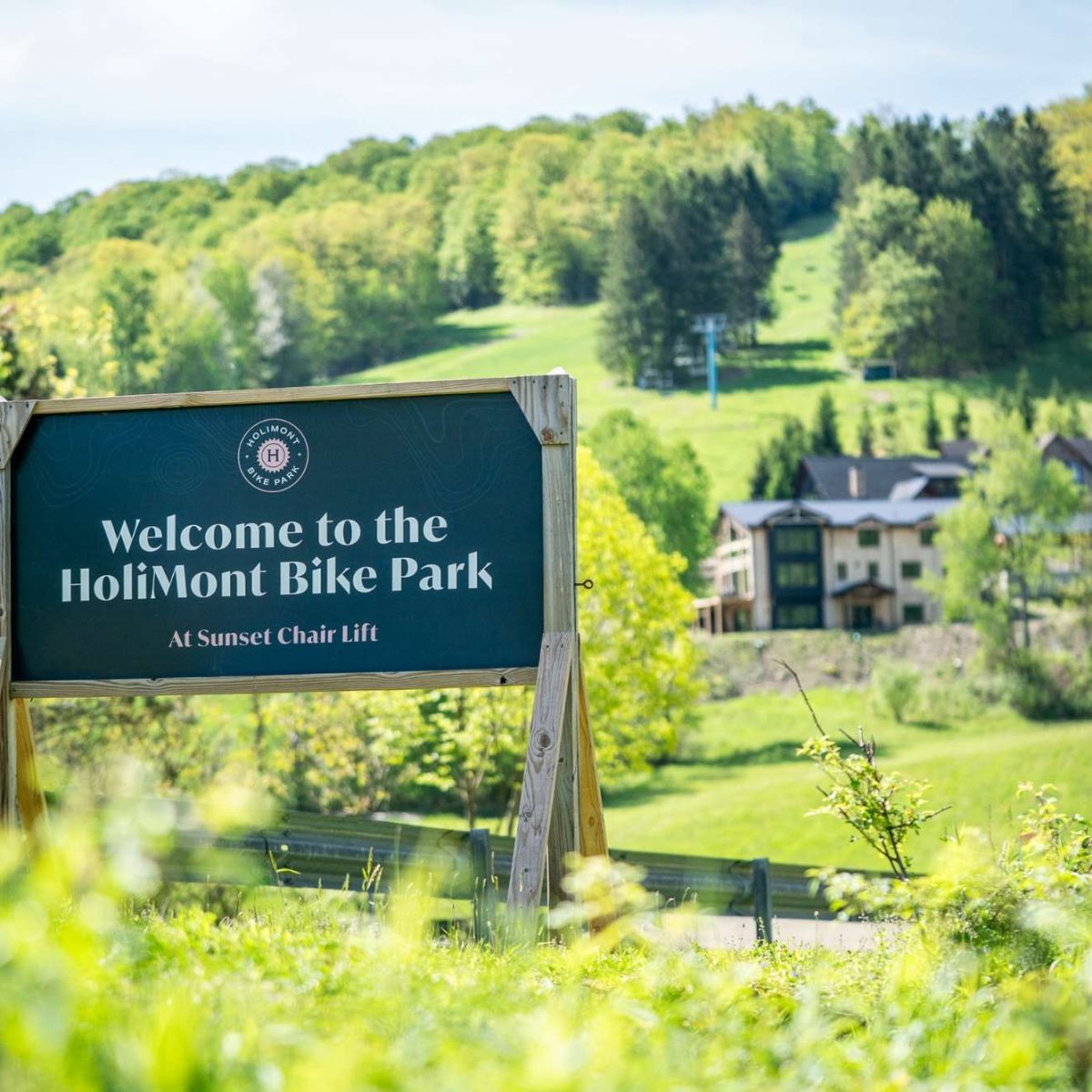 holimont-bike-park-sign-sunset-chairlift